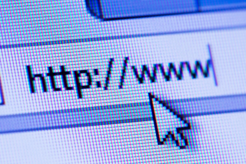 Search bar with URL on a computer screen close up.