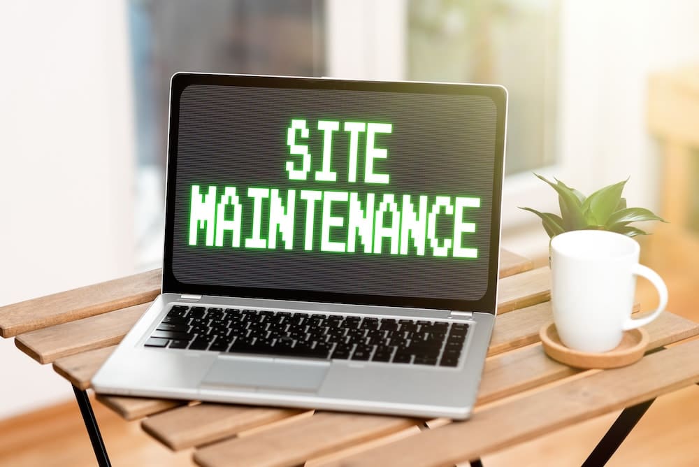 Laptop with website maintenance